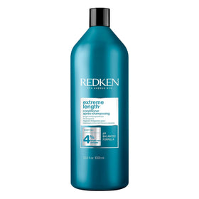 Redken bottle front view showing label and large salon-size benefit