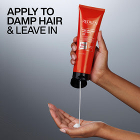 Redken being applied to damp hair demonstrating detangling and slip