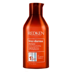 Redken Frizz Dismiss front packaging showing sleek bottle and brand benefits