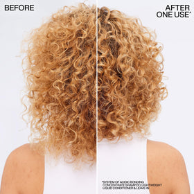 Redken conditioner texture on hand demonstrating lightweight, non-greasy feel