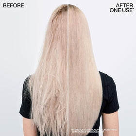 Redken mask applied to wet hair in shower for fast five-minute treatment