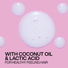 Redken on dry hair showing controlled frizz and added shine