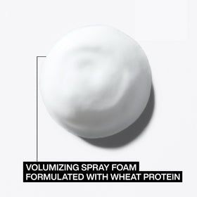 Redken foam being applied during blow dry to boost root lift