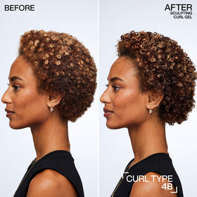 Applying Redken gel to damp curls for defined, frizz-controlled results