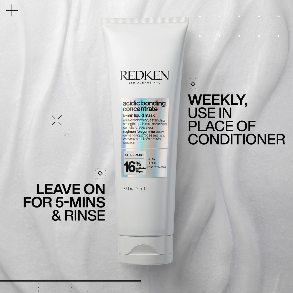 Redken 1 fl oz size comparison on hand to show travel-friendly, salon-strength portion
