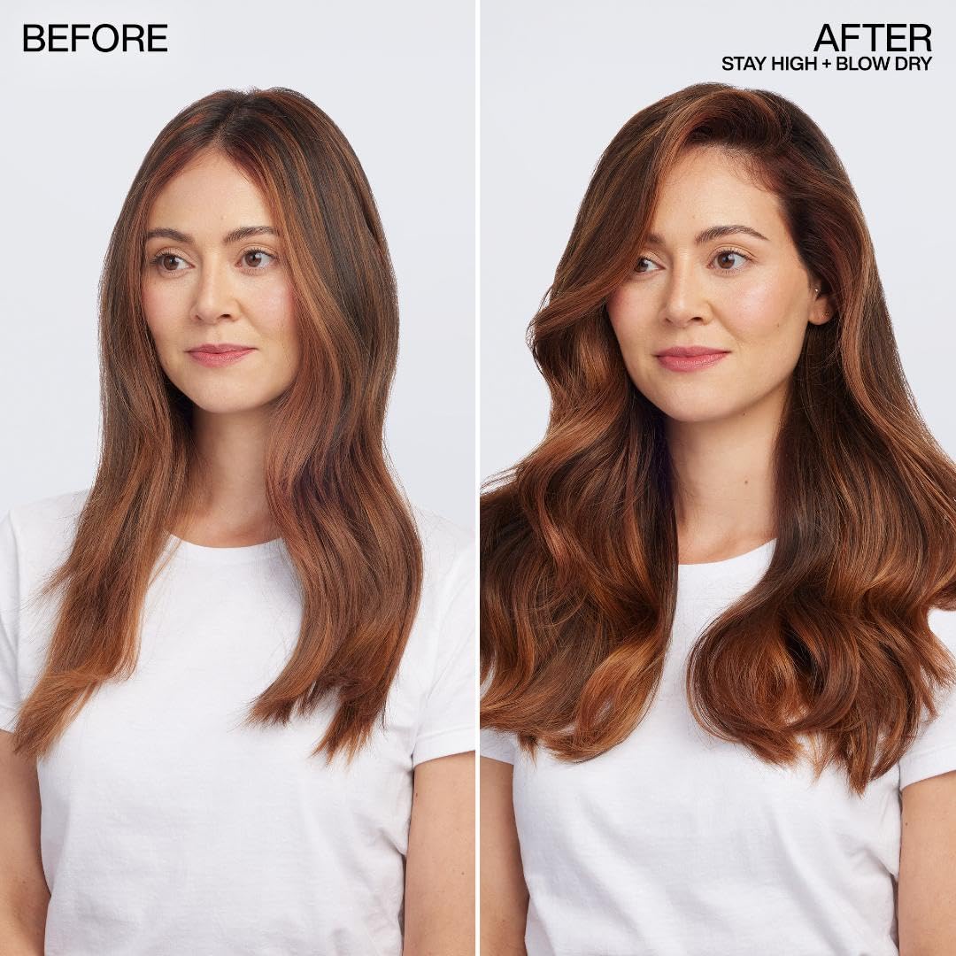 Redken stay high foam dispensed on hand illustrating airy mousse for root lift