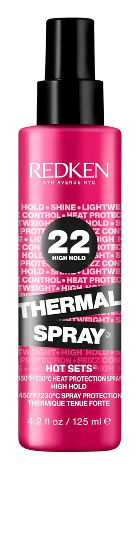 Redken bottle front packaging showing product name and benefits