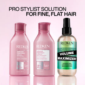 Redken product being applied to mid-lengths, visualizes detangling and softening benefit