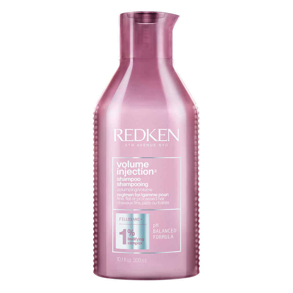 Redken bottle front view showing product and instant lift benefit