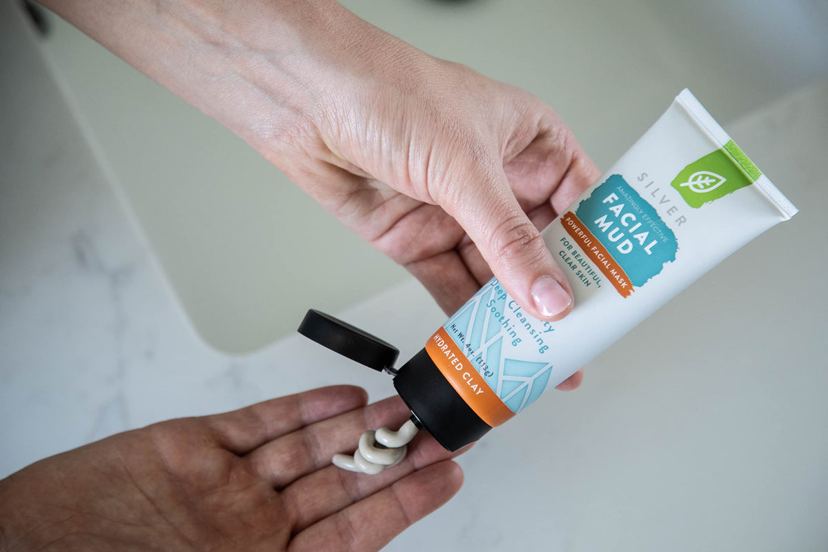 Redmond clay applied on model cheek demonstrating gentle purification