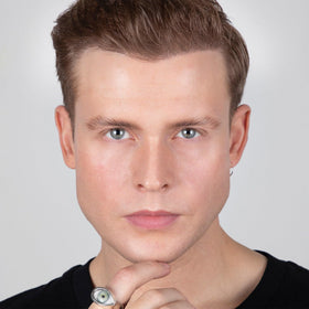 REFY Brow Sculpt in use combing brows to shape and lift hairs for laminated look benefit