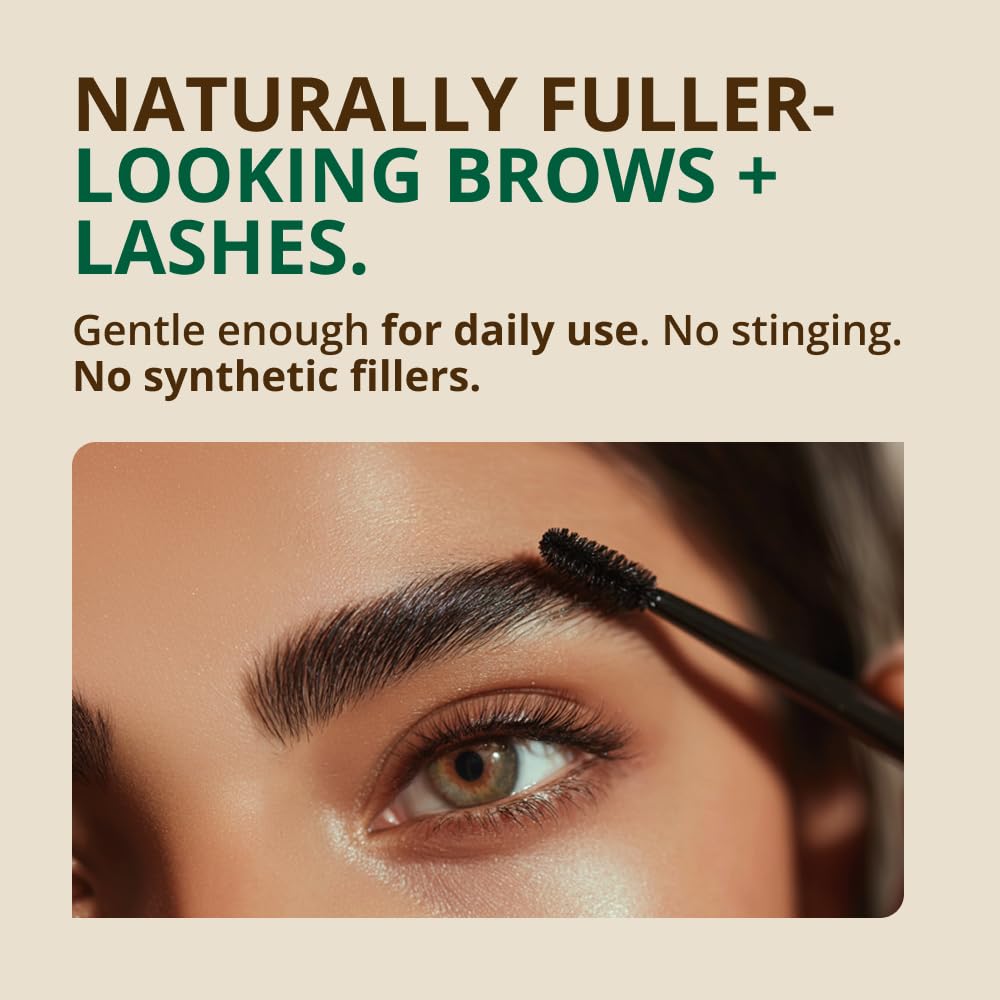 Applying RejuveNaturals with spoolie to lashes for targeted conditioning