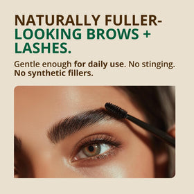 Applying RejuveNaturals with spoolie to lashes for targeted conditioning