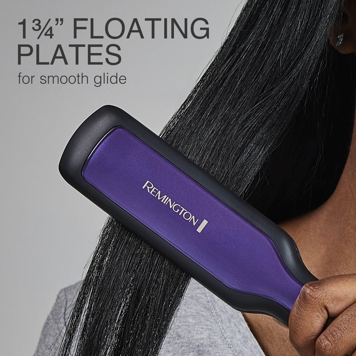 Remington in-use straightening long hair to reduce frizz and speed styling