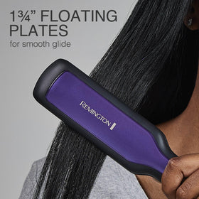 Remington in-use straightening long hair to reduce frizz and speed styling