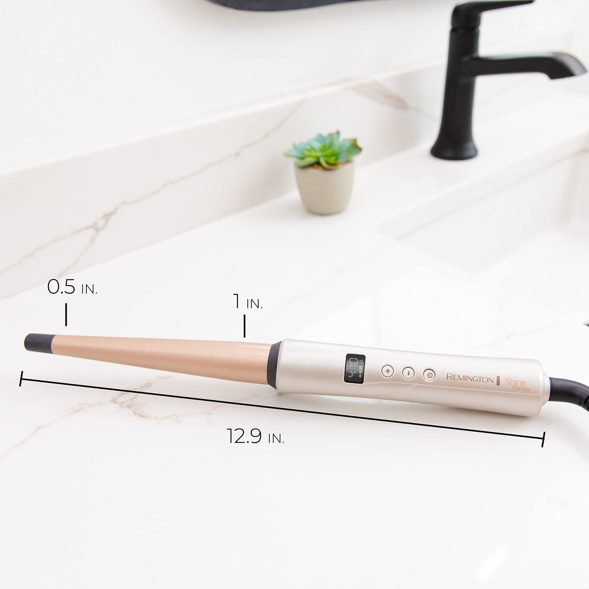 Remington lifestyle image on bathroom vanity illustrating everyday styling and quick heat-up