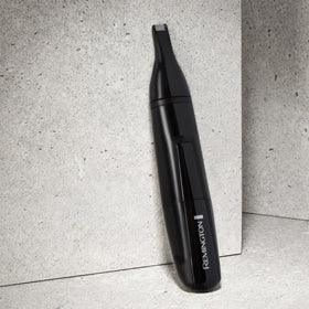 Remington NE3150 held in hand to show lightweight control and scale
