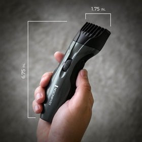 Remington pop-up detail trimmer in use defining neckline for precise edge shaping