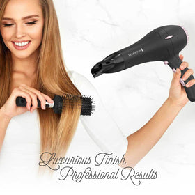 Remington held in hand to show size and ergonomic handling benefit