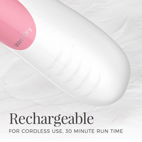 Remington shaver held in hand to show size and travel-friendly design