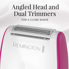 Remington shaver held in hand demonstrating compact size for travel