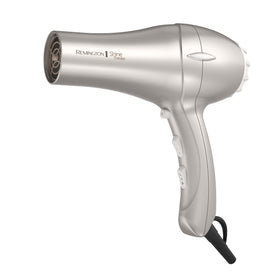 Remington grill close-up showing argan oil and keratin infusion for smoother hair