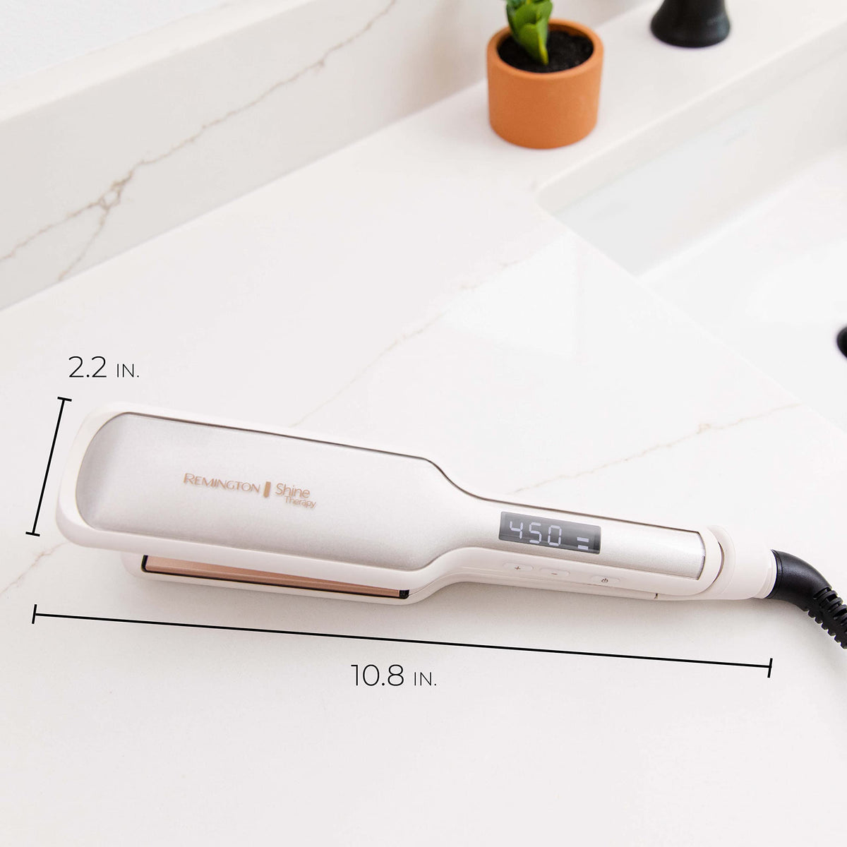 Remington product packaging with straightener and accessories for on-the-go styling
