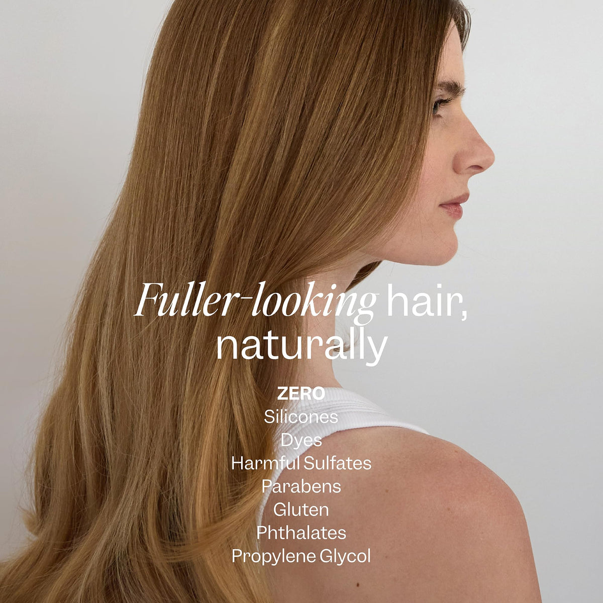 Renpure mousse being applied to roots, builds lift and fuller-looking hair