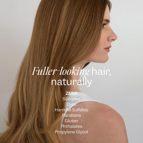 Renpure mousse being applied to roots, builds lift and fuller-looking hair