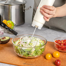 Restaurantware side profile filled bottle highlighting translucent fill visibility