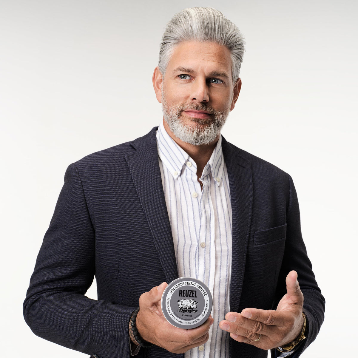 REUZEL on barbershop shelf demonstrating professional appeal