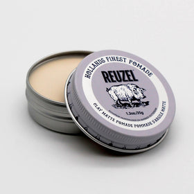 REUZEL close-up of pomade texture highlighting matte texture and grip benefit