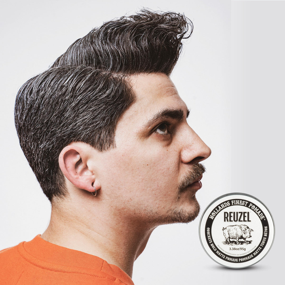 REUZEL styled hair on model demonstrating matte texture and definition