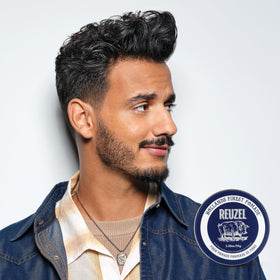 REUZEL fiber pomade label close-up highlighting vanilla mint scent details