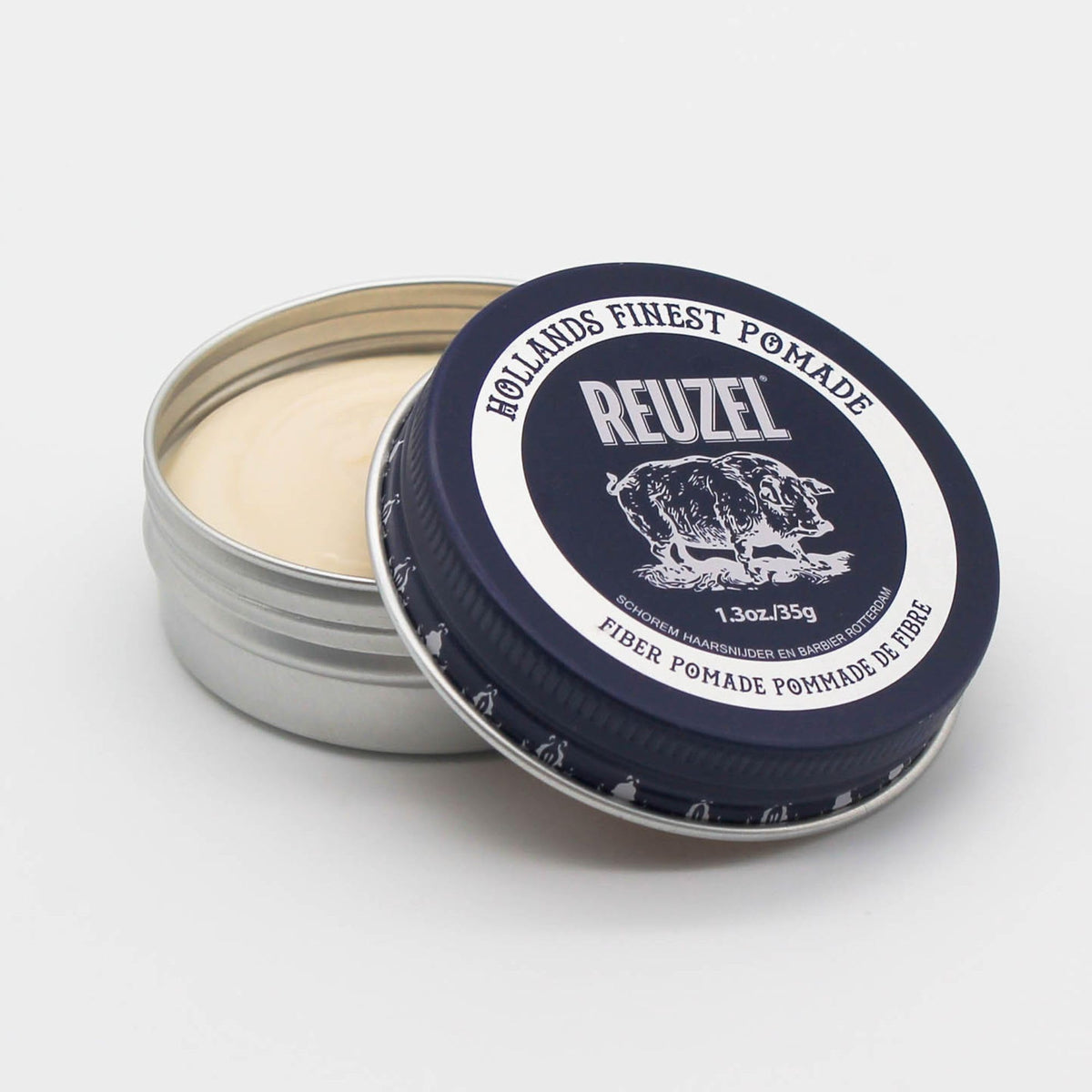 REUZEL Fiber Pomade texture closeup demonstrating matte hold and easy restyle