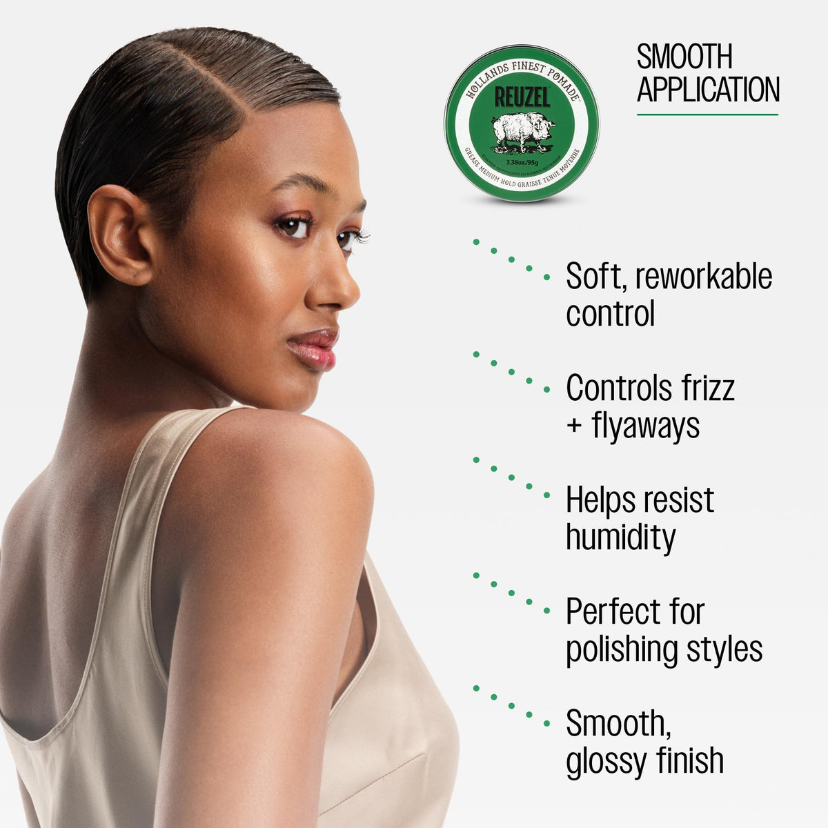 REUZEL hands applying pomade demonstrating easy spread benefit