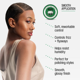 REUZEL hands applying pomade demonstrating easy spread benefit