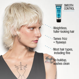 REUZEL grooming cream applied on fingers ready to style for easy control