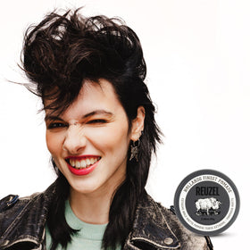 REUZEL styled hair outdoors showing matte texture and volume
