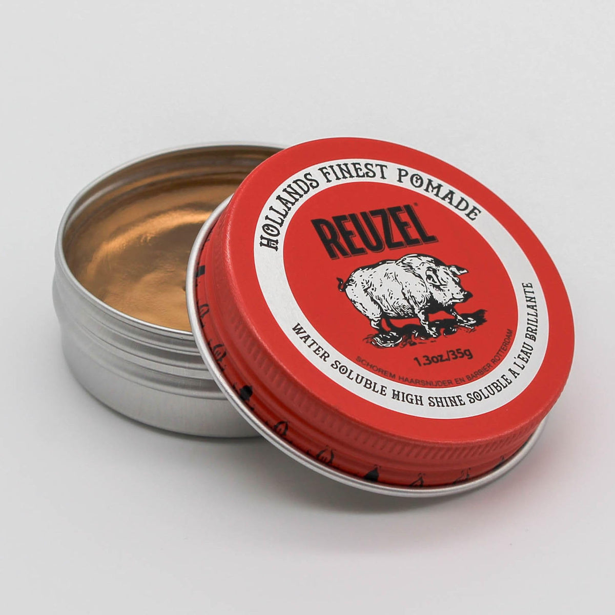 REUZEL red pomade texture close-up creamy paste for smooth easy application