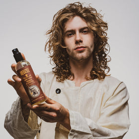 REUZEL hair detail showing matte finish and touchable, non-stiff texture