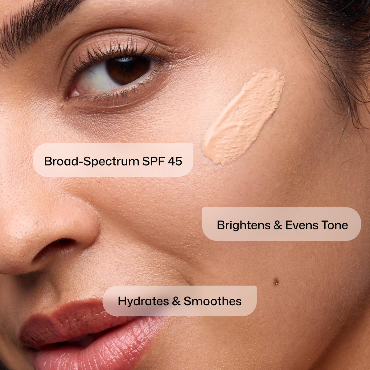Revision Skincare tinted swatch blended on skin showing universal tint effect