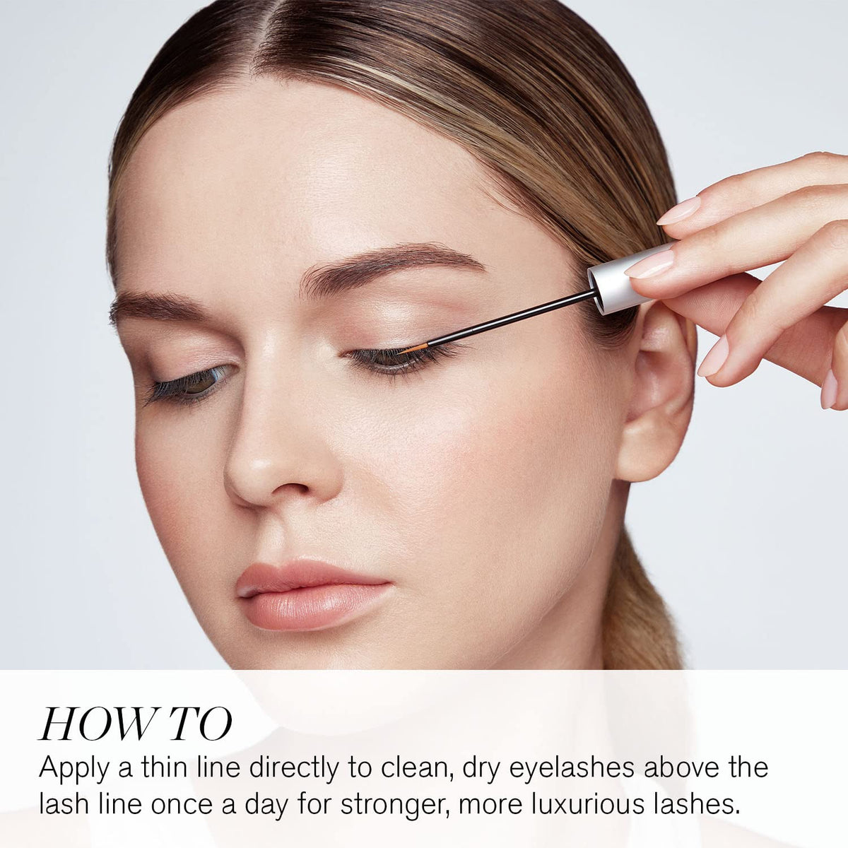 RevitaLash applicator closeup on upper lash line, demonstrating precise application for better lash health