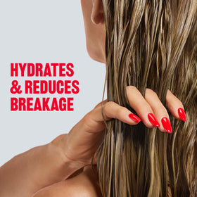 REVLON ColorSilk bottle in bathroom setting showing everyday routine benefit