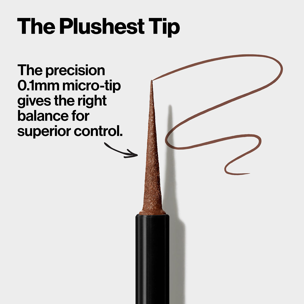 REVLON applicator held in hand showing control and ease of use for steady strokes