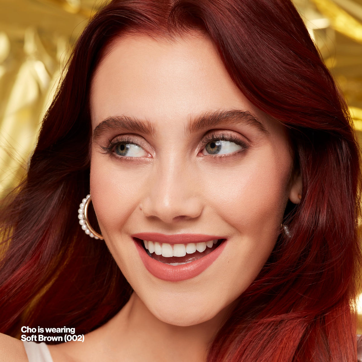 Revlon clear gel wand detail showing brush for lifting and setting brows