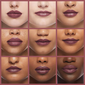 Close-up of lips wearing Revlon ColorStay Royal Raisin showing satin finish