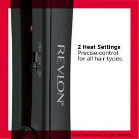Revlon flat iron in hand demonstrating silicone grip comfort and precise control