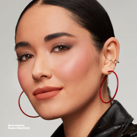 Revlon flatlay with shades showing Poster Child among 16 flattering options