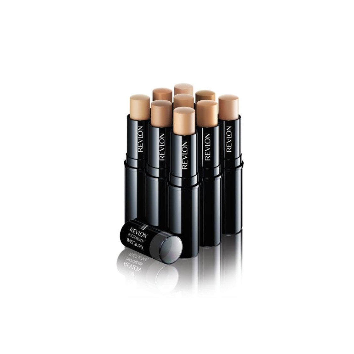 Revlon PhotoReady beside lipstick to show compact size and travel-friendly benefit
